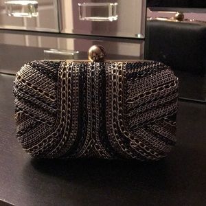 Mixed-metal chain clutch